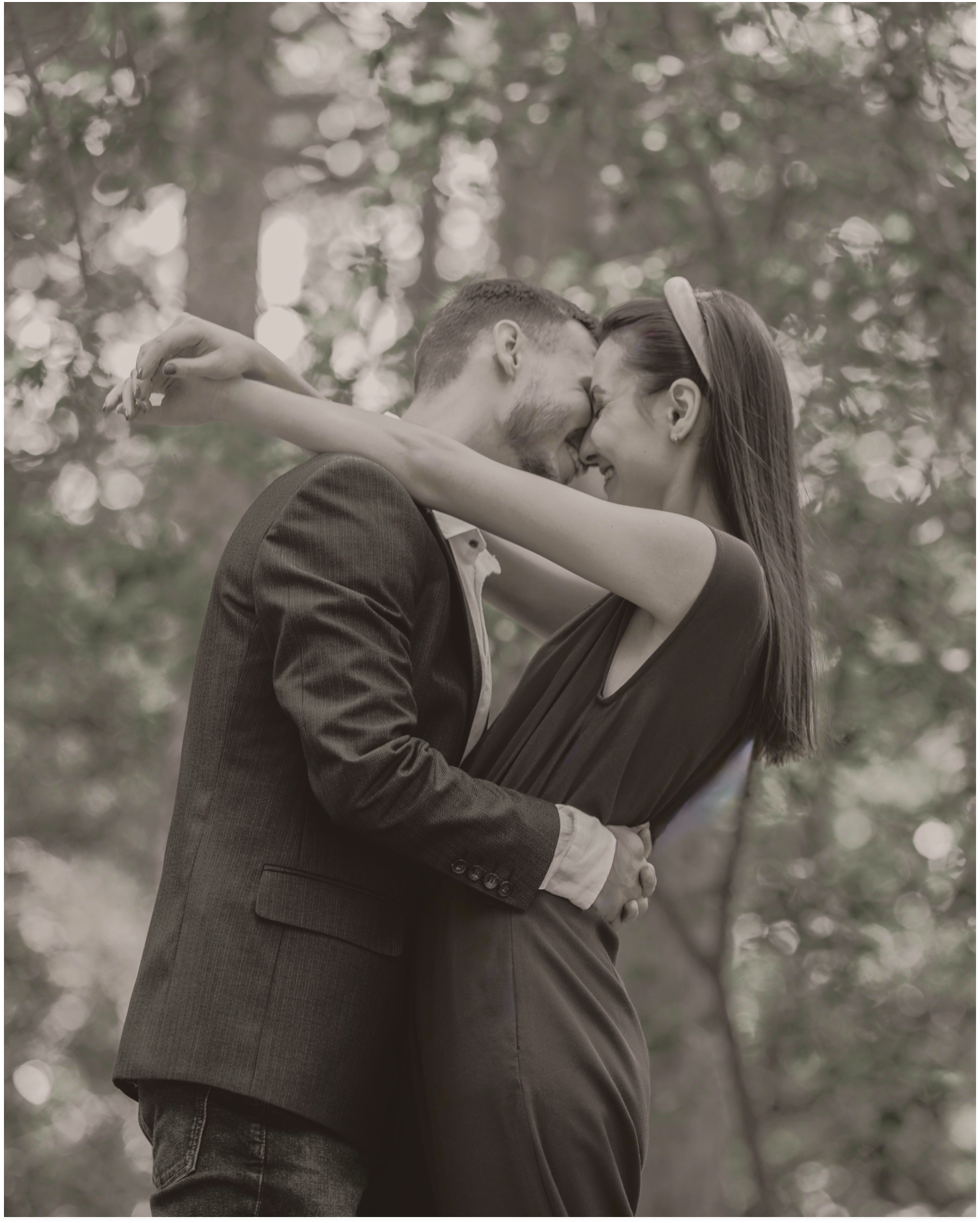 Elegant cinematic wedding couple embrace outdoors